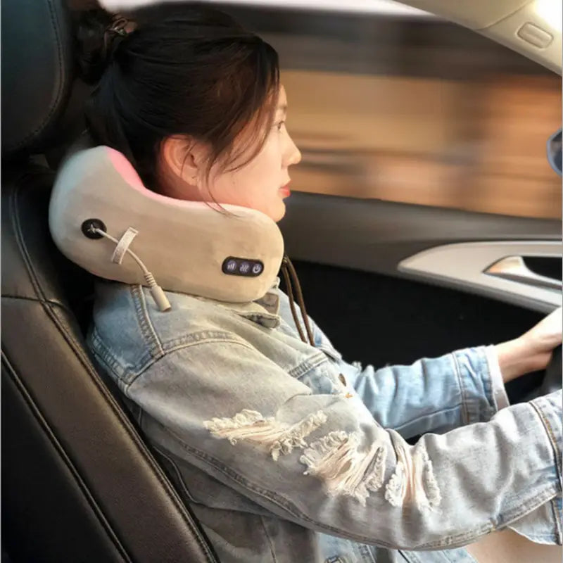 light blue fabric car massage pillow with soft cushioning beige massage neck pillow and control buttons for soothing car massage relief