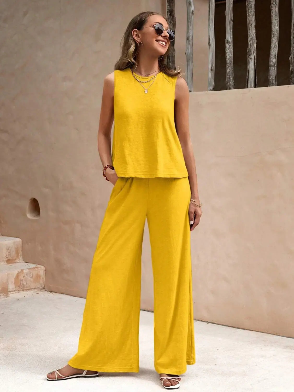 bright yellow sleeveless top and matching casual loose wide-leg pants set ideal for comfortable casual loose wear