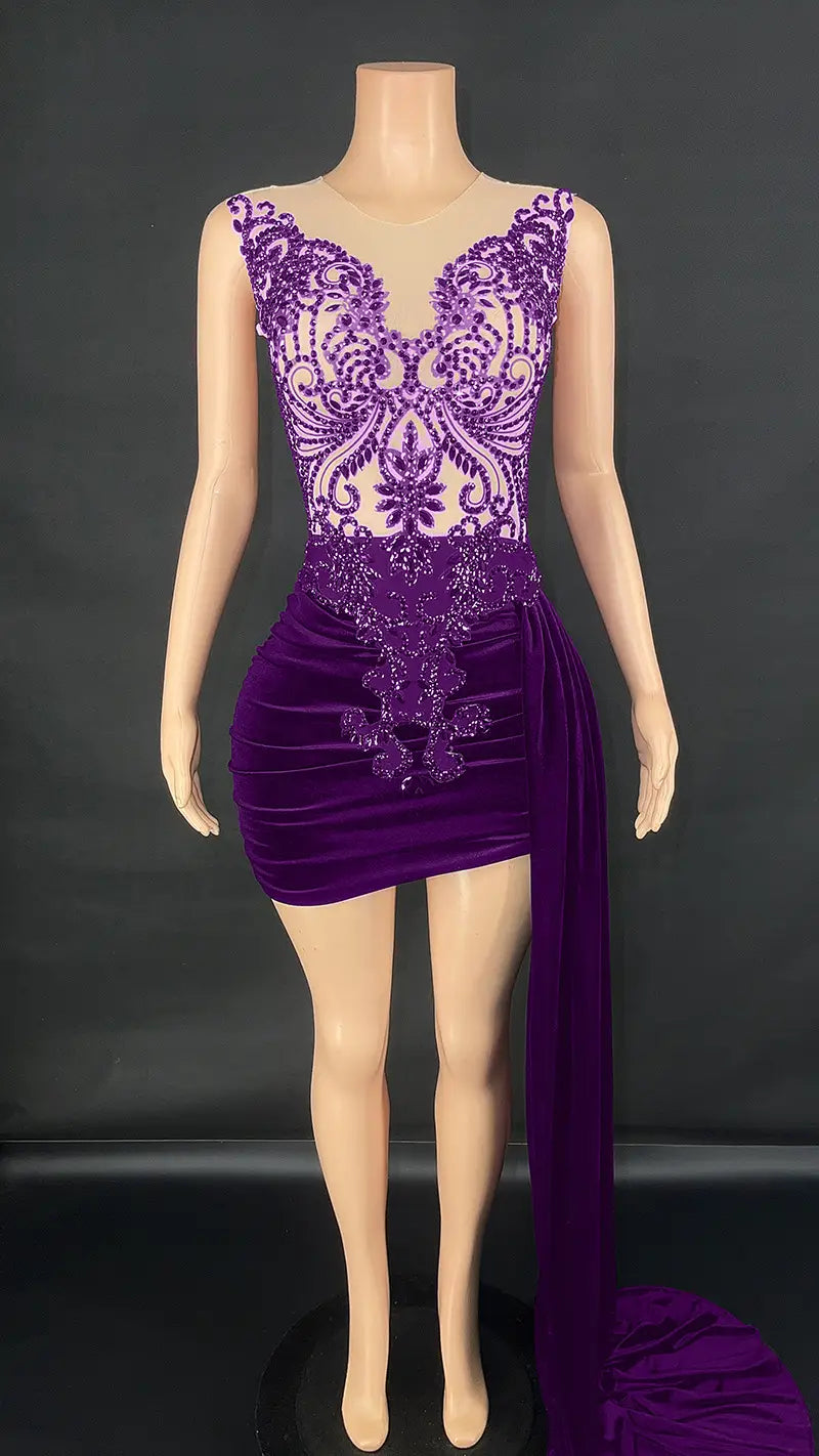 black velvet luxury evening dress featuring a shimmering purple velvet mini design with intricate lace and beaded detailing on the bodice, side slit, and draped fabric, ideal for a summer luxury evening or evening dress female occasion.