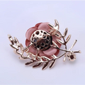 Delicate fabric flower lady temperamental pin floral brooch set featuring a pink rose with gold-toned leaves and branches