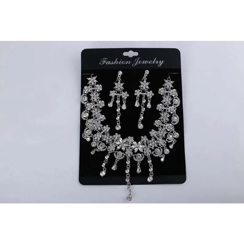 Silver floral necklace set with dangling crystal teardrops displayed on black card for factory direct bride dress diamond choker