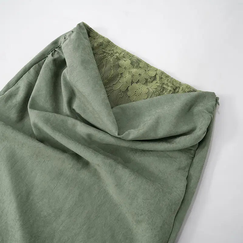 a soft sage green lace backless tube scarf featuring delicate floral lace lining with sling stitching ruffle and stitching ruffle hip accents