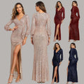 A fantasy celebrity sexy sequined evening dress in rose gold with long sleeves high slit and wrap design