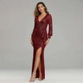 A burgundy sequined evening dress with a deep v-neckline long sleeves and a high slit fantasy celebrity sexy style
