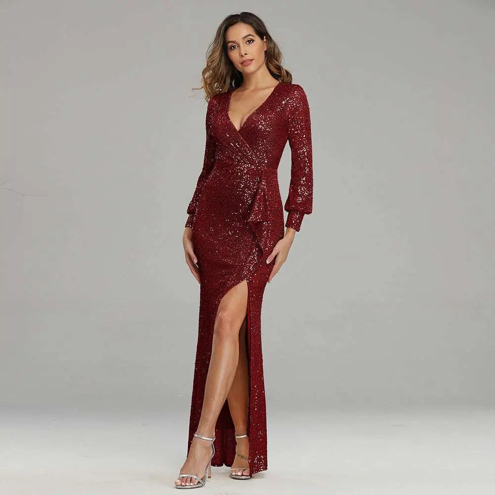 A burgundy sequined evening dress with a deep v-neckline long sleeves and a high slit fantasy celebrity sexy style