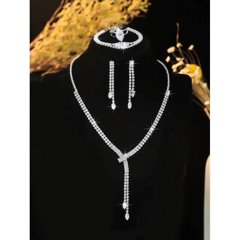 Fashion simple necklace earring bracelet set featuring a sparkling silver rhinestone necklace with a delicate chain and teardrop pendants