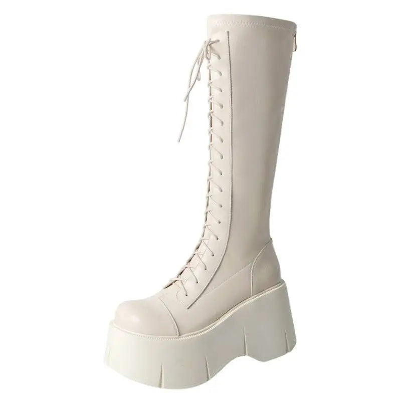 Cream-colored fashion white platform lace up high boots with thick chunky sole in leather knee-high style