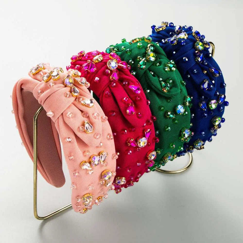 A collection of colorful knotted headband elegant adorned with diamond-embedded high-grade design in pink red green and blue