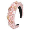 Pink floral headband featuring a delicate pink pearl design with gold butterflies and beige flowers for fashionable wear