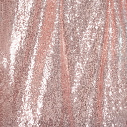 rose gold sequined fabric with a shimmering textured surface on a large bridesmaid dress suitable for evening dress and bridesmaid dress banquet occasions.