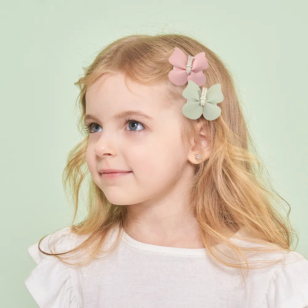 pastel pink and mint green leather butterfly bag clip children’s barrettes with a soft fabric-like finish