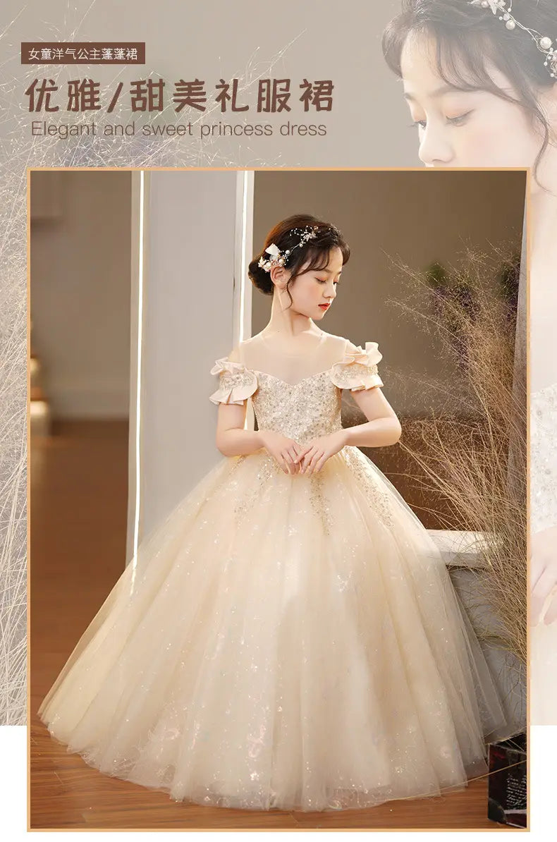 Elegant champagne spandex princess dress for girls featuring an off-the-shoulder design with delicate lace and sparkling embellishments atop a soft tulle tutu.