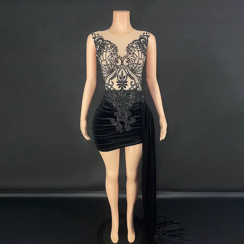 black velvet luxury evening dress with intricate silver beading lace detailing on the bodice side slit and flowing train perfect as a summer luxury evening dress for female use