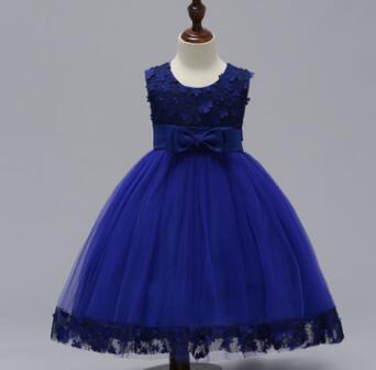Royal blue lace appliquéd kids girls princess dress with a fitted bodice, bow belt, and layered tulle summer skirt kids design.