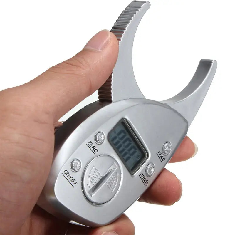 Silver digital body fat caliper with textured grip and lcd display for precise body fat measurement