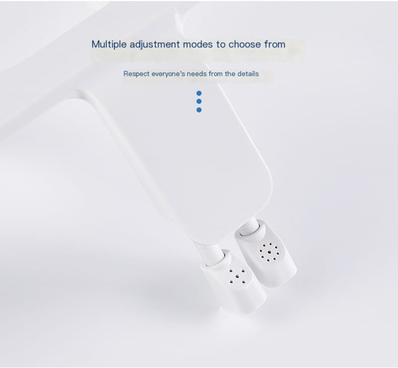 White plastic ultra-thin dual nozzle bidet toilet cleanser with adjustable perforated nozzle tips in a toilet cleanser image.