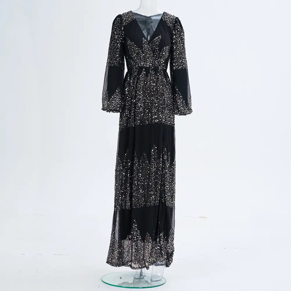 black rust bell sleeve sexy long sequined evening dress featuring sheer sequined panels and a v-neckline.