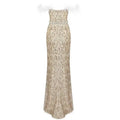 A shimmering champagne sequin evening dress featuring feather raglan large sleeves and an elegant beaded belt at the waist