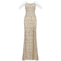 A champagne sequin evening dress with feather raglan large slit sexy design and gold sequin detailing and beaded belt