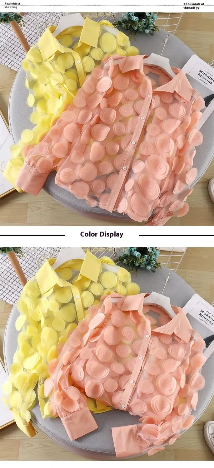 pastel pink and yellow floral-patterned chiffon gauzy shirt with button-up front made of lightweight flower chiffon fabric.