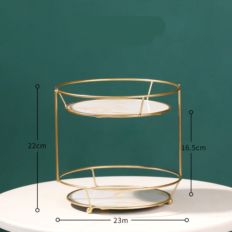 two tier gold dressing table finishing rack with white marble like circular trays from royale essence lux for elegant organizing and display