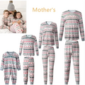 Festive family matching reindeer pajama sets in soft knit fabric with red reindeer green pine trees and white snowflakes on gray