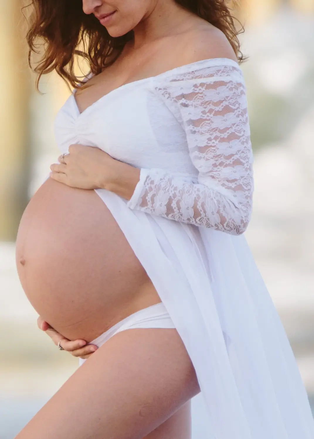White off-the-shoulder long sleeve lace maternity dress made from main fabric highlighting american white sexy style.
