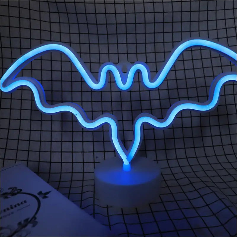 Flamingo led modeling light blue neon bat-shaped decorative night light with sleek curved design and white base