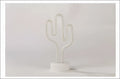 White neon cactus lamp with sleek minimalist design used as decorative led modeling night light