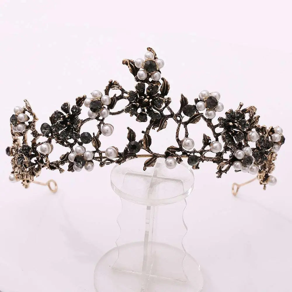 Ornate floral black diamond pearl baroque bridal crown in black and silver with dark gemstones and pearls