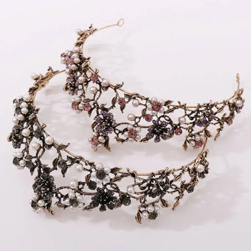 Delicate gold-toned floral black diamond pearl baroque bridal crown adorned with white pearls pink and purple crystals