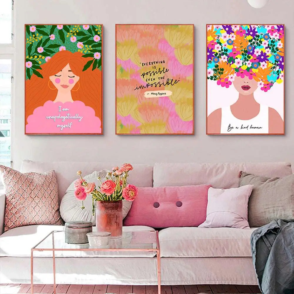 Three colorful framed floral botanical nordic girls wall art canvas prints hang above a sofa with inspirational quotes