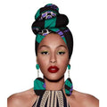 Vibrant green black and purple patterned fashion african headscarves styled in elegant top knot with matching earrings set