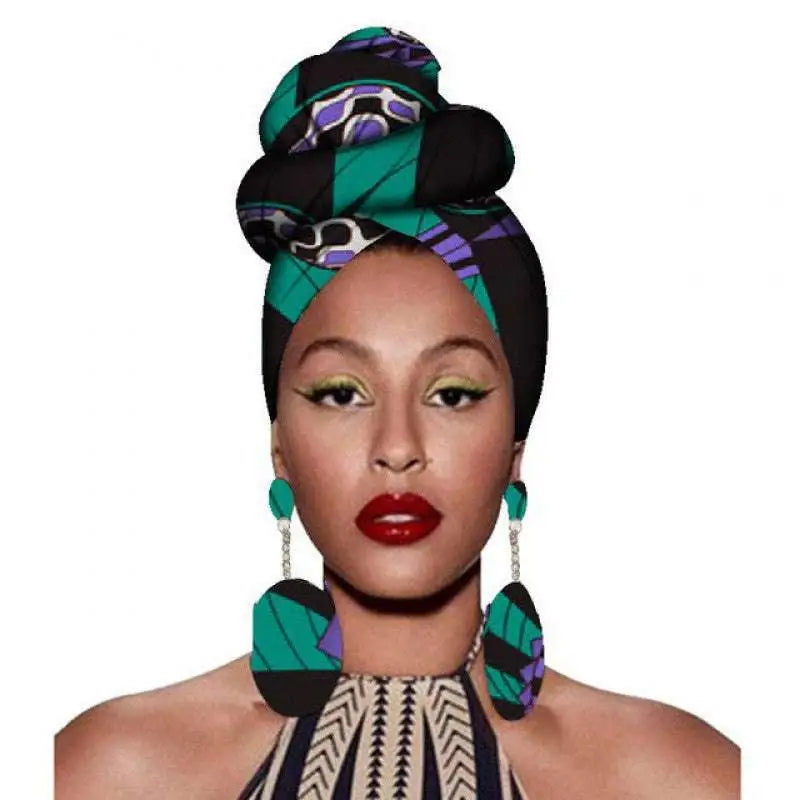 Vibrant green black and purple patterned fashion african headscarves styled in elegant top knot with matching earrings set