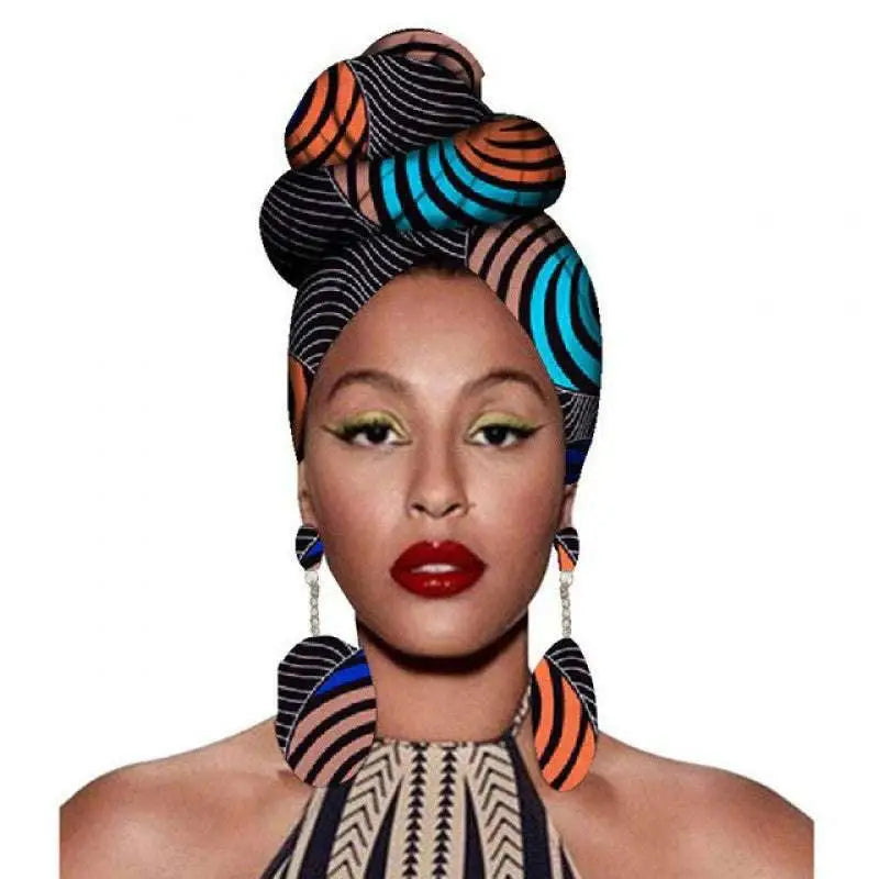 A vibrant fashion African headscarves set featuring a patterned orange black and teal headwrap in an intricate bun style