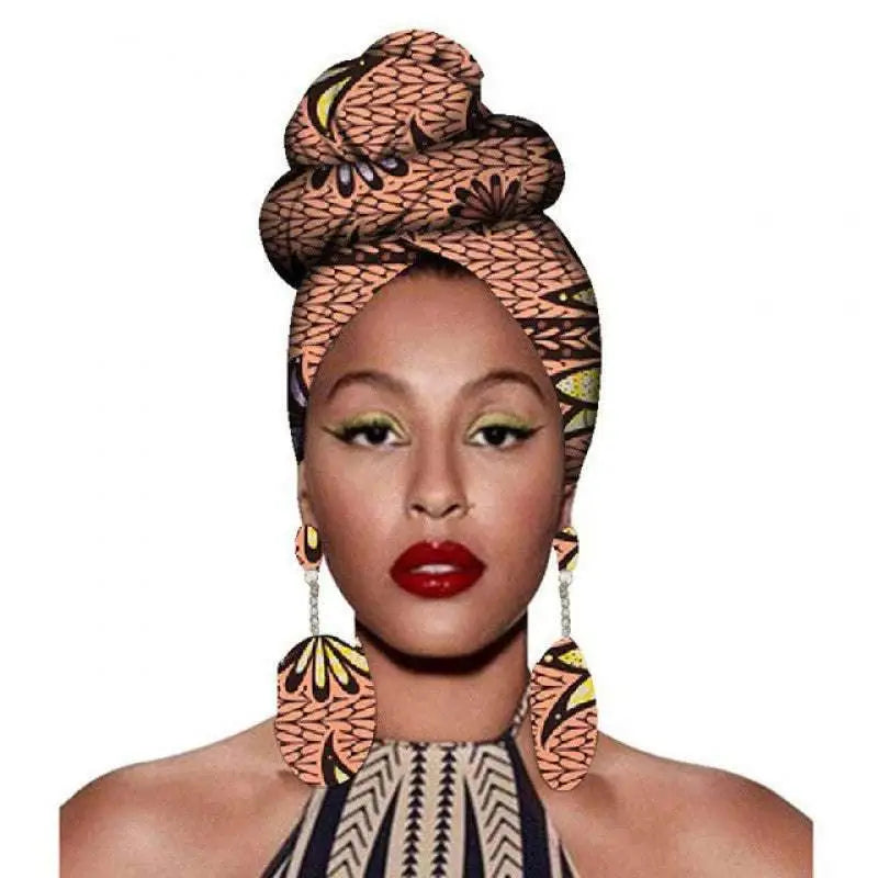 A vibrant peach and brown patterned fashion african headscarves and earrings set with intricate geometric designs