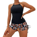 Black floral halterneck printed halter bikini with peach and white hibiscus shorts and side ties halter split swimsuit