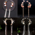 Elegant gold-toned floral hanfu tassels girls fashion headbands with delicate beads faux fur pom-poms and pastel hues