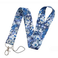 Floral molly mobile phone strap featuring a blue and white floral fabric with a silver metal clasp for secure use