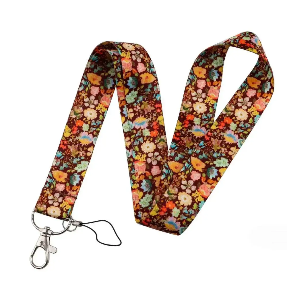 Floral molly mobile phone strap with black cord and silver metal clasp featuring a floral-patterned lanyard design