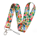 Floral molly mobile phone strap featuring a colorful floral pattern with a silver metal clasp and black cord