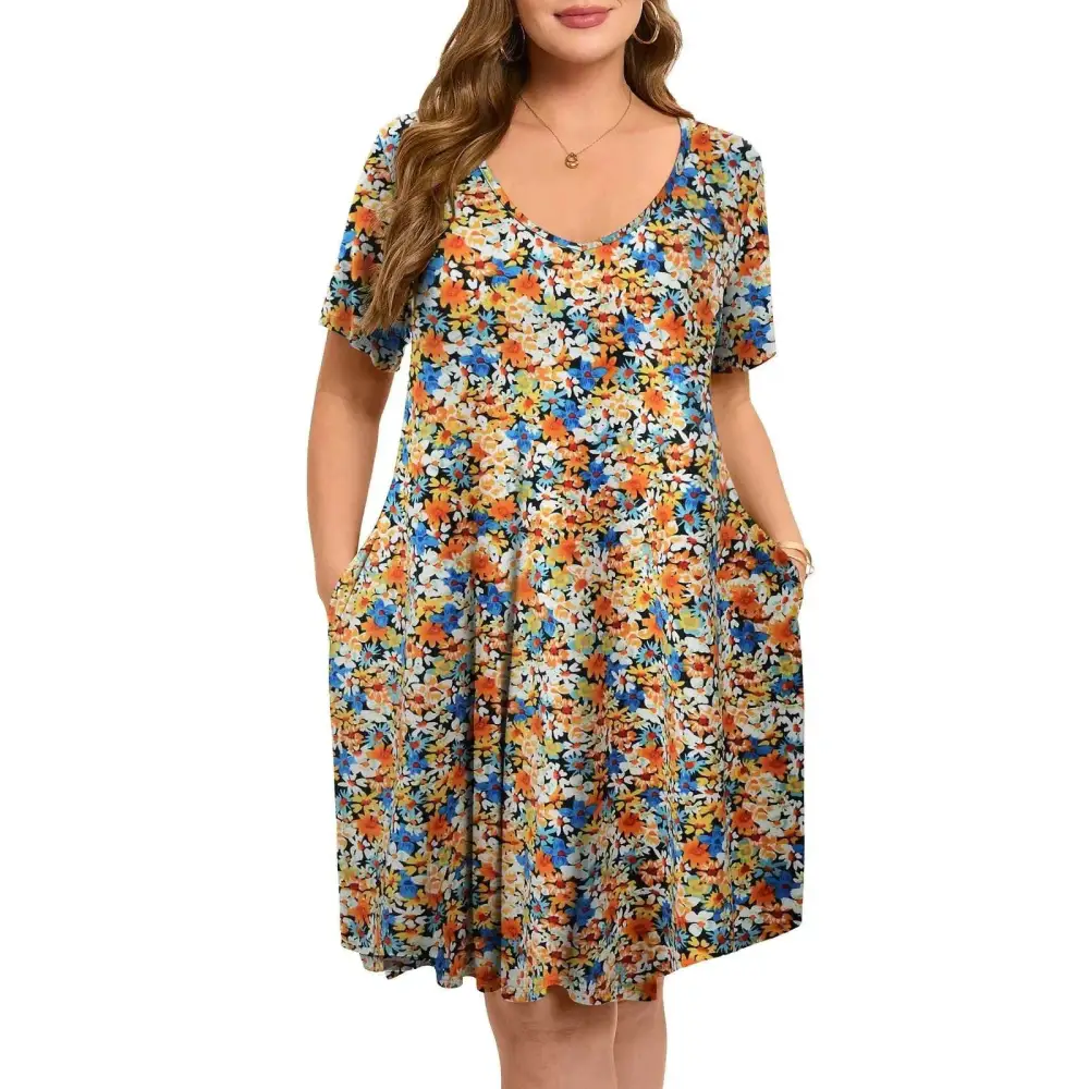 Floral plus size summer swing dress with short sleeves v-neckline featuring vibrant orange blue yellow blossoms on dark fabric