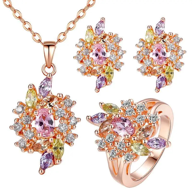 Floral rose gold aaa zirconium jewelry set featuring a floral design with pink yellow and purple gemstones surrounded by crystals