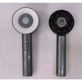 Two matte gray handheld comb scalp massagers with infrared led lights for advanced infrared hair care treatment