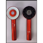 Red fluffy comb scalp massager infrared device with white red circular and black textured heads for infrared hair care