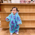 A fluffy monster cute blue and purple baby jumpsuit with hood made of soft faux fur material