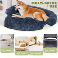 A navy blue fluffy plush dog couch bed mat with a soft shaggy texture and cozy rounded design for pets