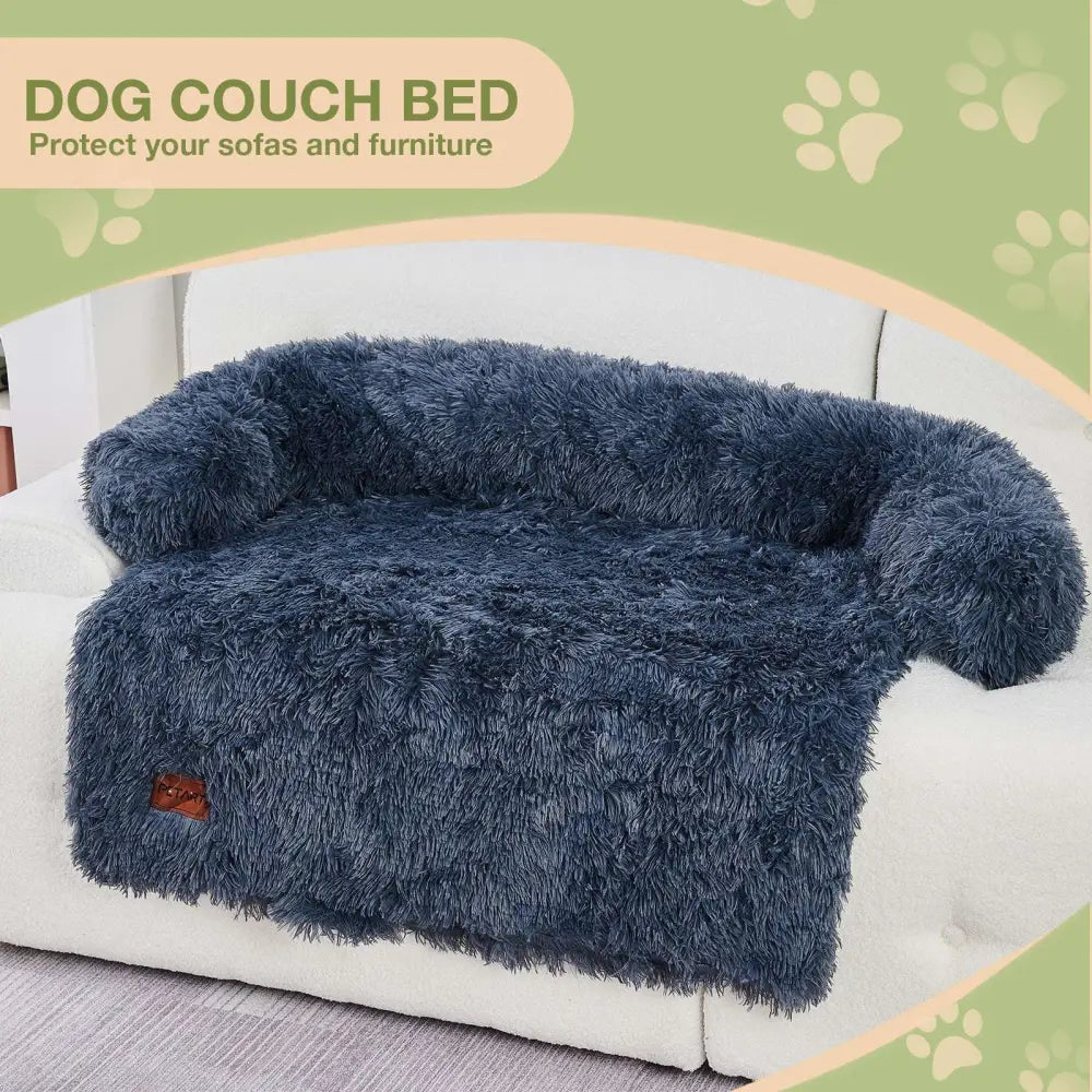 Deep navy blue fluffy plush dog couch bed mat with rounded armrests and cozy cushioned faux fur design