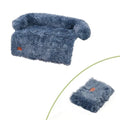 Blue fluffy plush dog couch bed mat with cozy shaggy texture and rounded armrests for pet comfort