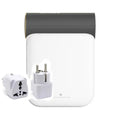 White and gray travel adapter with gold-trimmed top and two detachable plug converters for small quick dryer use